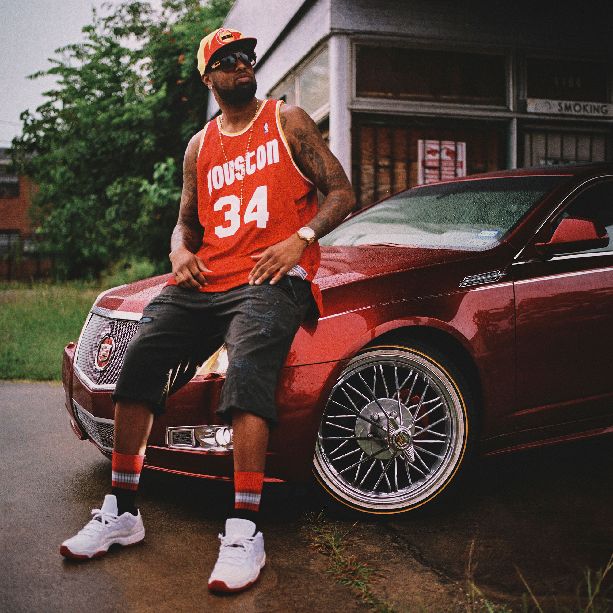 Slim Thug, hip hop artist, is photographed with one of his slabs near MacGregor Park in Houston, Texas, by Houston editorial and commercial photographer, Todd Spoth.