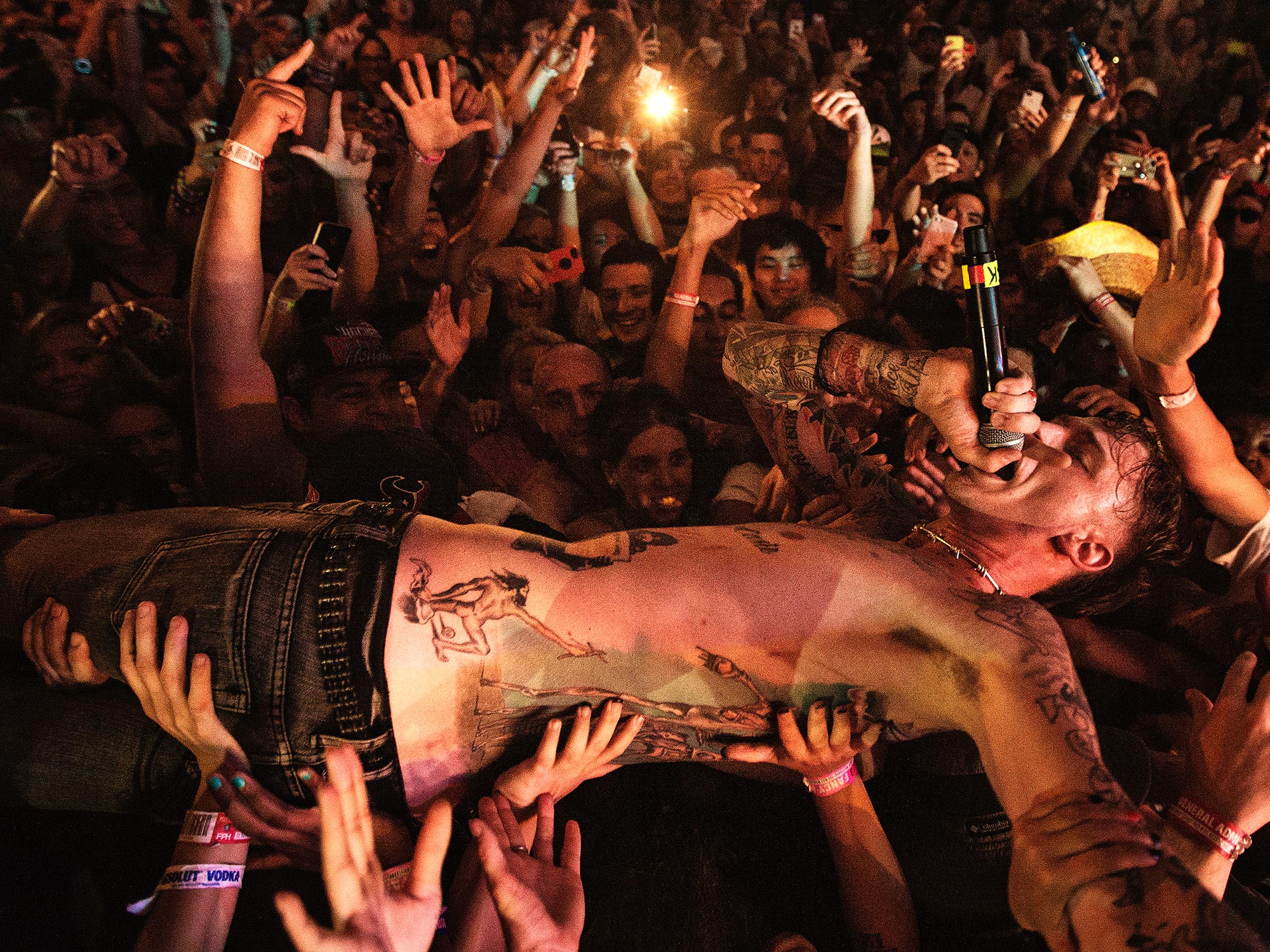 Machine Gun Kelly,  hip hop artist, performs at the Free Press Summer Fest music festival, in Houston, Texas, photographed by Houston music photographer, Todd Spoth.