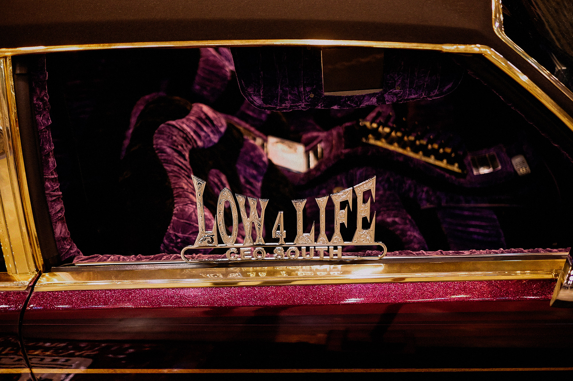 Slab details with gold accents, photographed by Todd Spoth at the Dub car show in Houston, Texas.