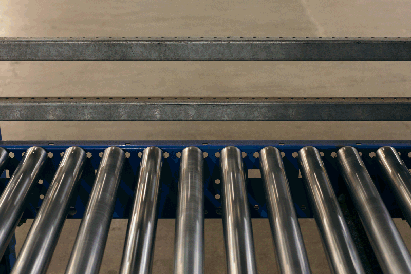 A conveyor belt operates at a Houston warehouse facility, produced by Todd Spoth.