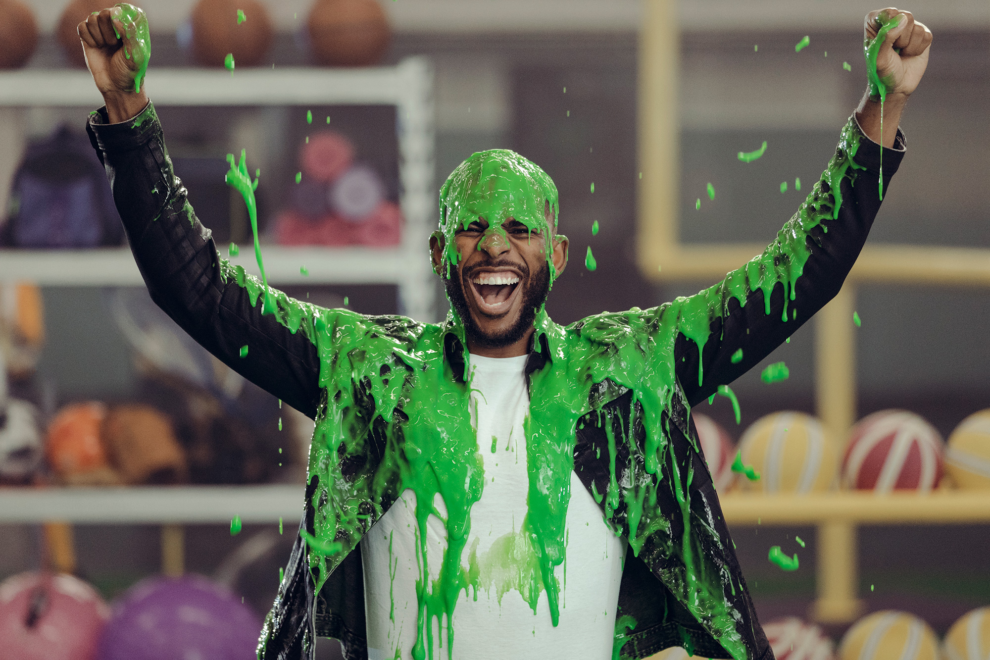 Chris Paul, NBA superstar is slimed during the filming of a commercial spot for Nickelodeon in Houston, Texas, photographed by commercial photographer, Todd Spoth.