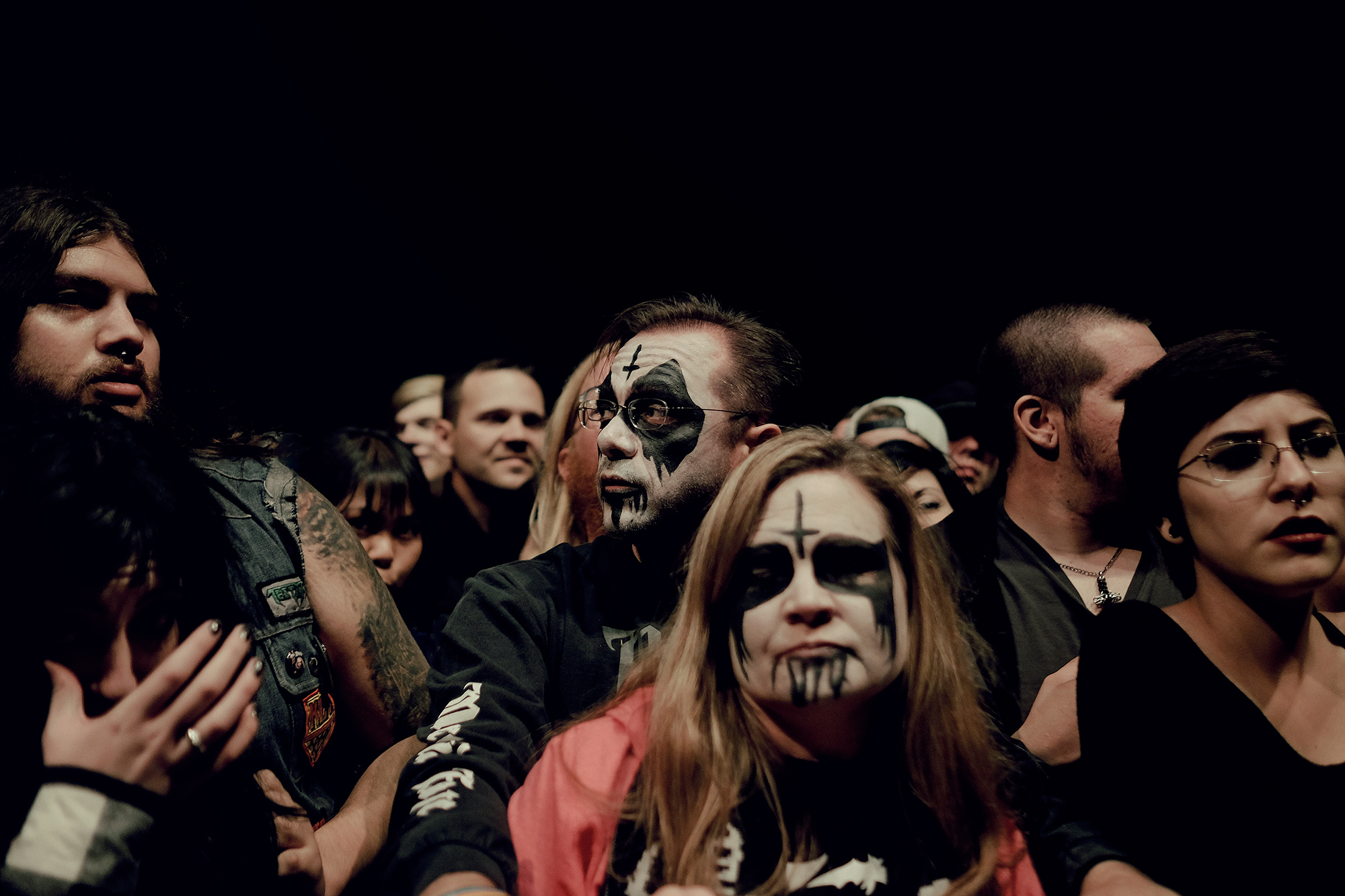 Metalhead parents at the metal show, photographed by music photographer, Todd Spoth.