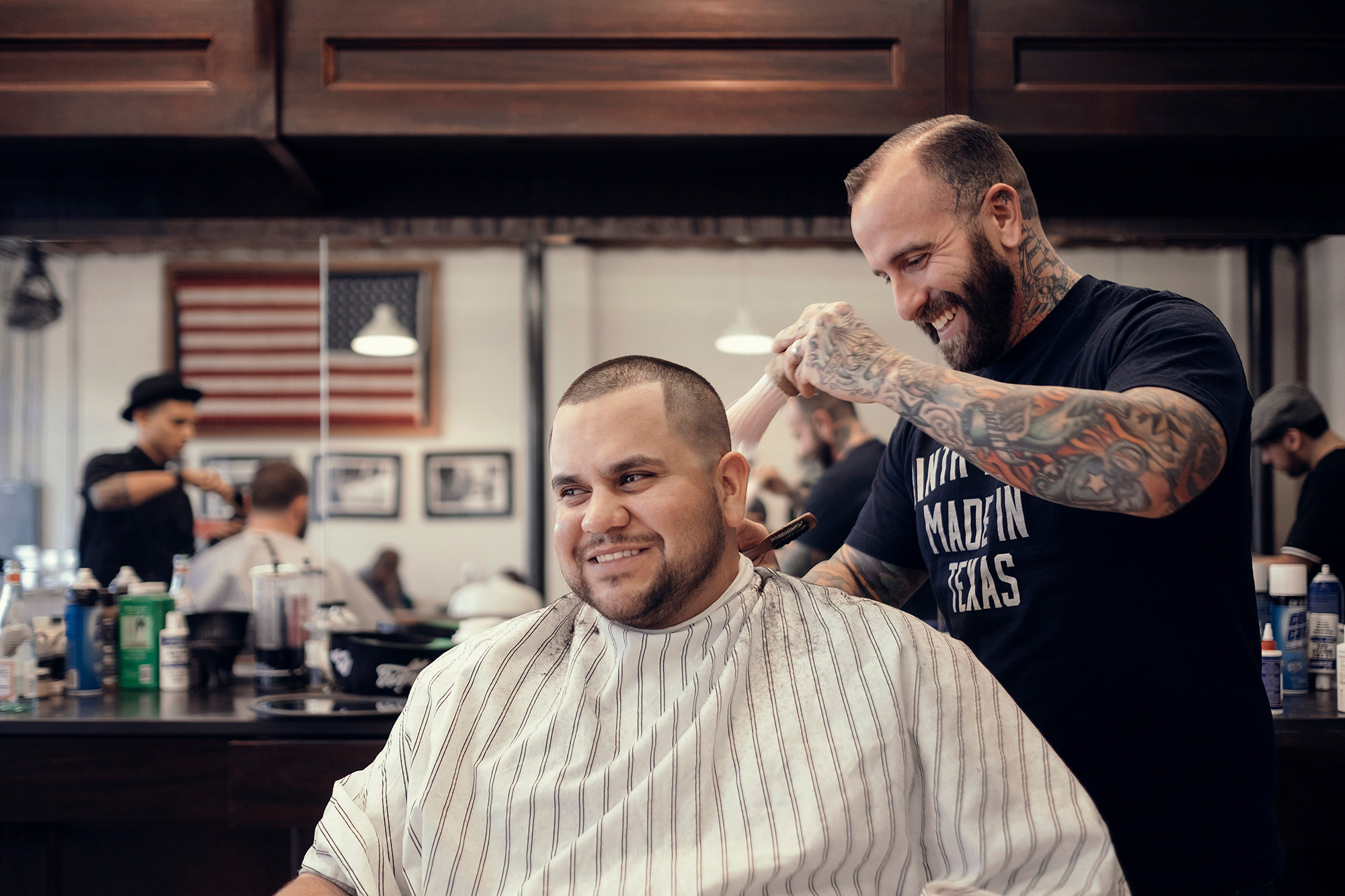 Ryan Chase Taylor, barber and owner of East End Barber, photographed at work by Houston photographer, Todd Spoth.