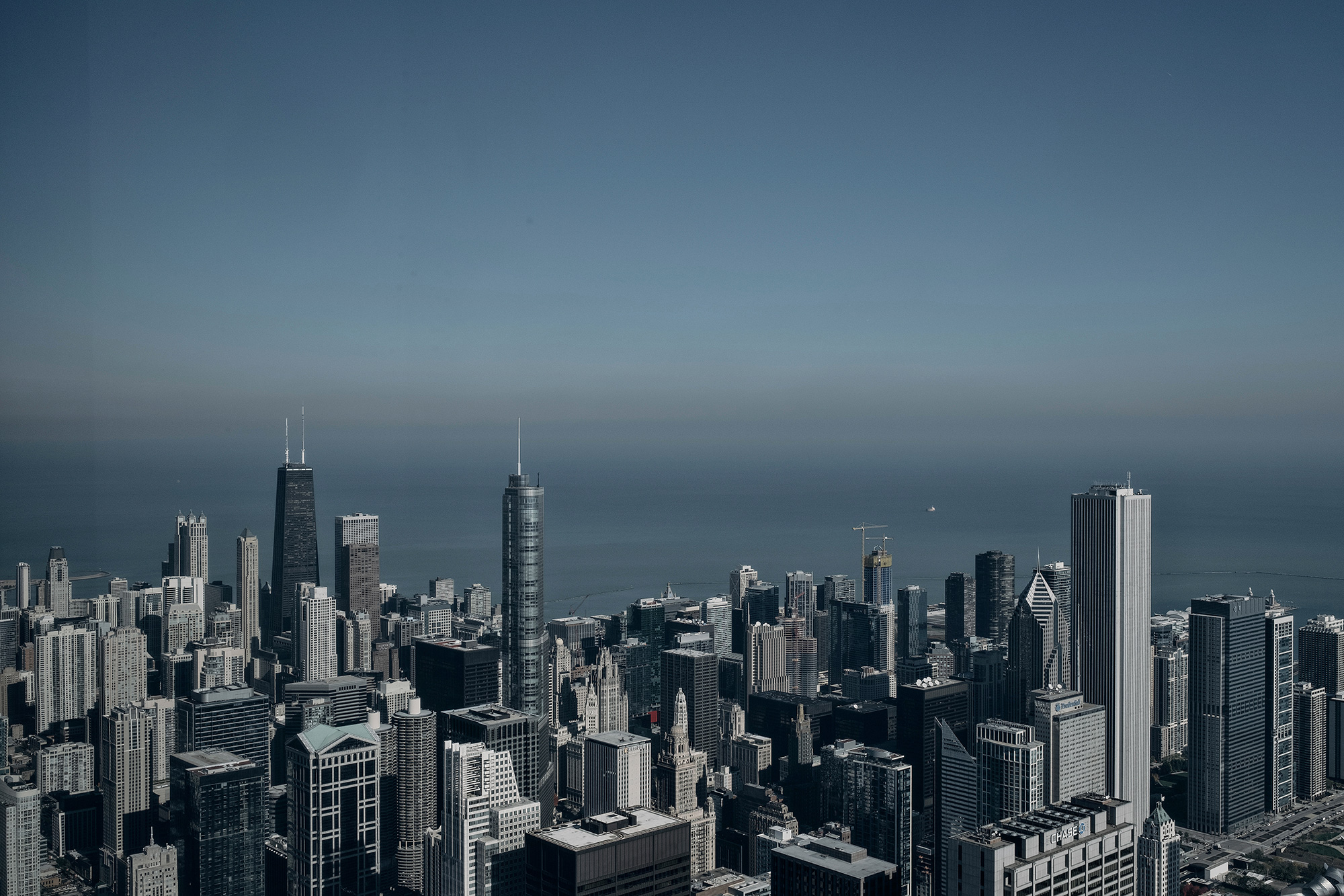 A view of the skyline of Chicago, Illinois as taken from the Sears Tower in downtown Chicago by photographer, Todd Spoth.