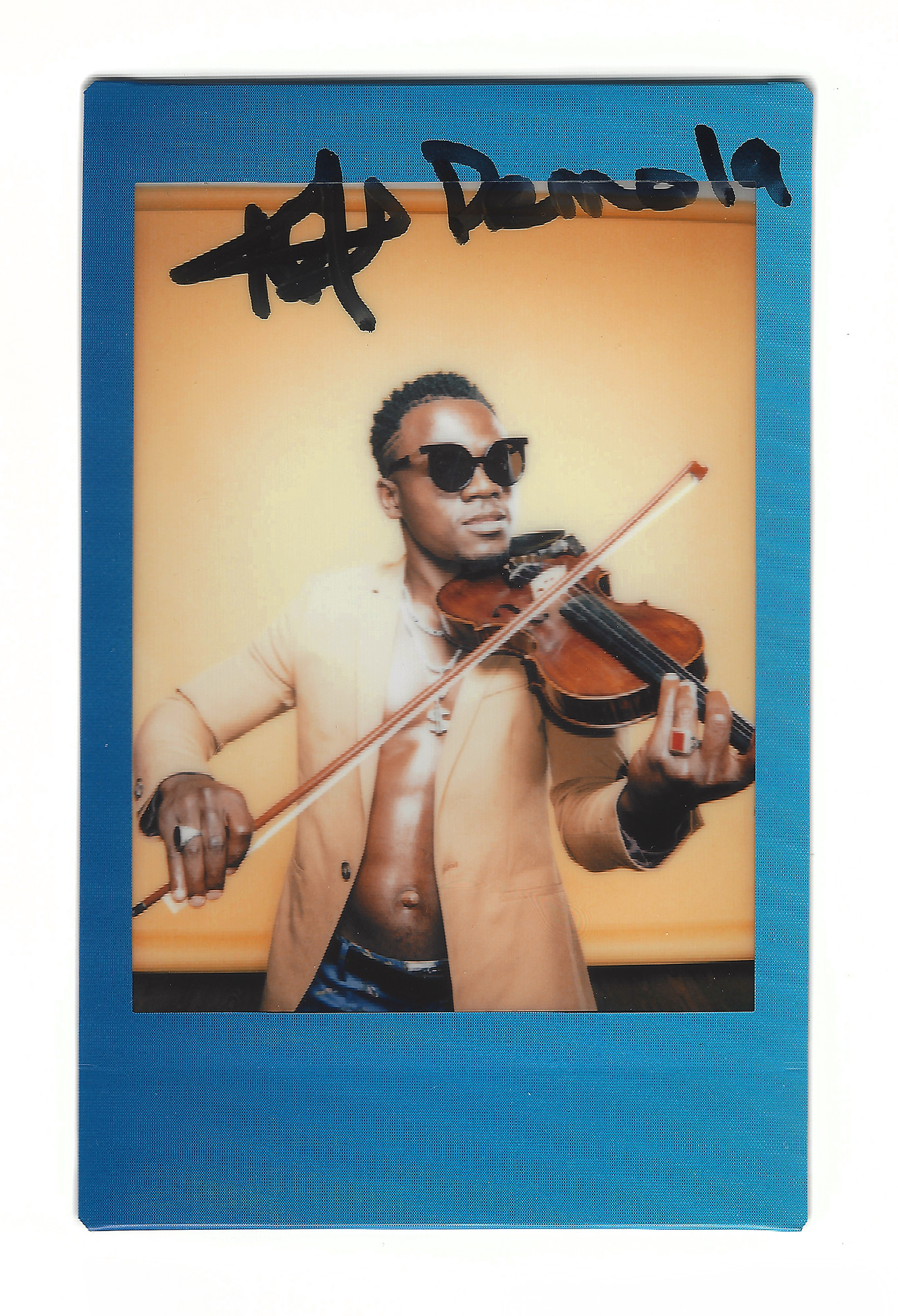 Demola, African violinist and hip hop artist, photographed in the Todd Spoth Photography studios in Houston, Texas by editorial and commercial photographer, Todd Spoth.